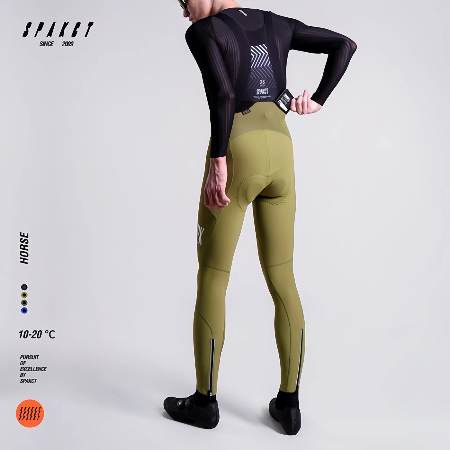 Rear side view of Spakct Horse avocado green winter cycling bibs, highlighting leg-side storage utility.