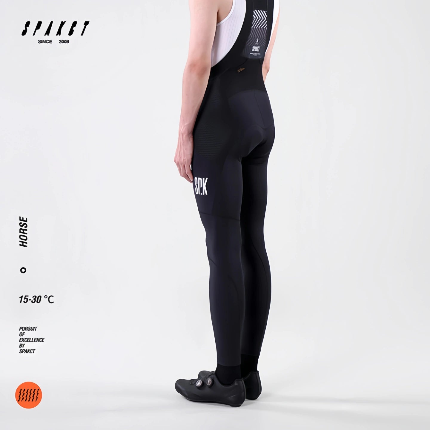 Rear side view of Spakct Horse men's long cycling bibs, showing supportive rear yoke and upper back strap layout.