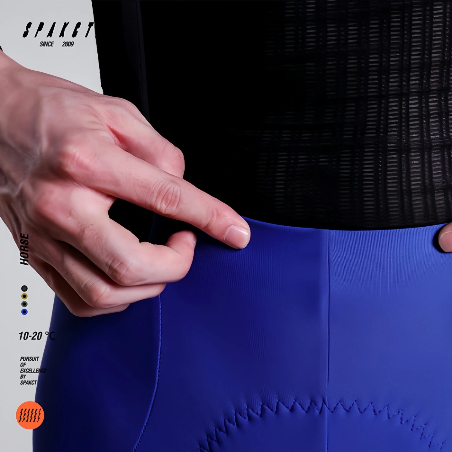 Close-up of pressure-relieving flat waist design on Spakct Horse sonic blue thermal road bike bib tights.