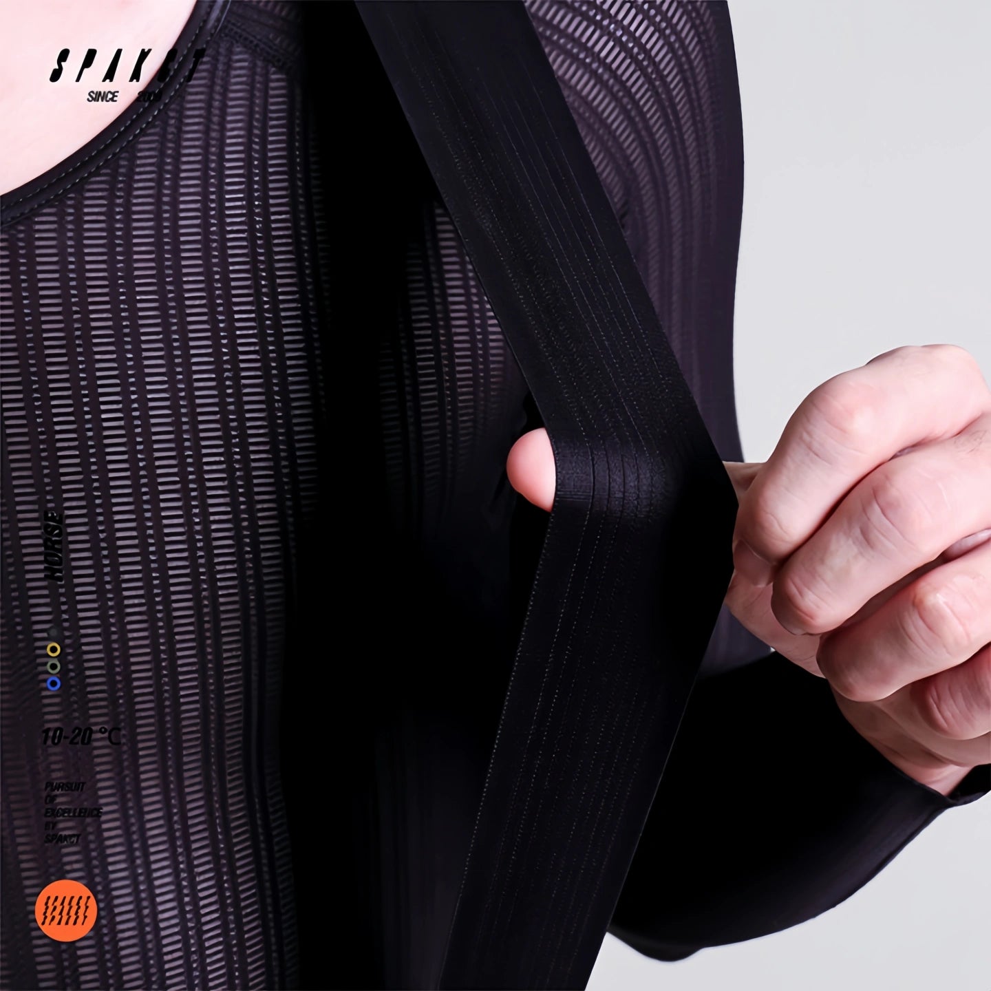 Close-up of lightweight non-inductive mesh shoulder straps on Spakct Horse men's cold-weather cycling bibs.
